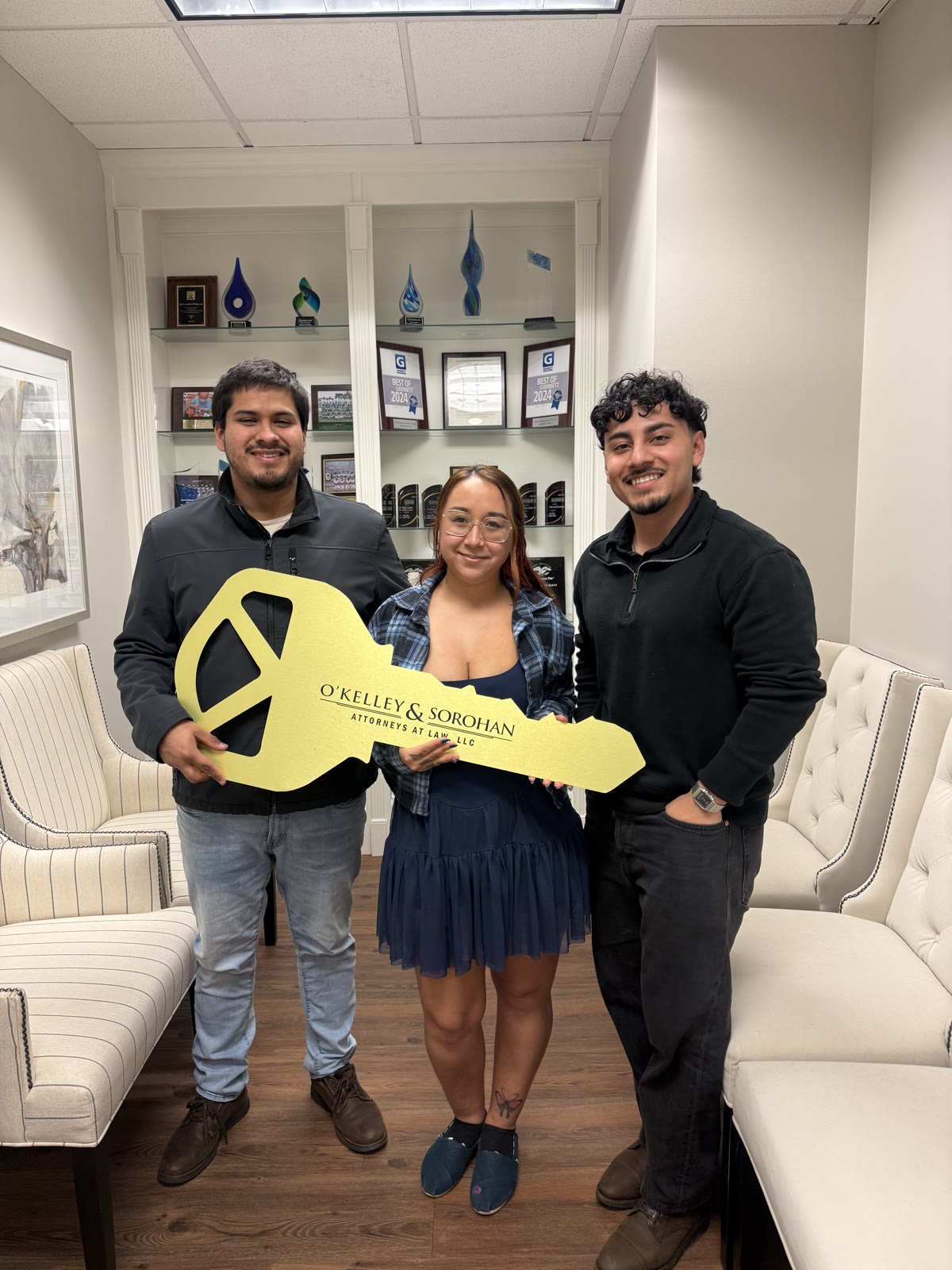 Justin Trevilla celebrating a real estate closing with clients