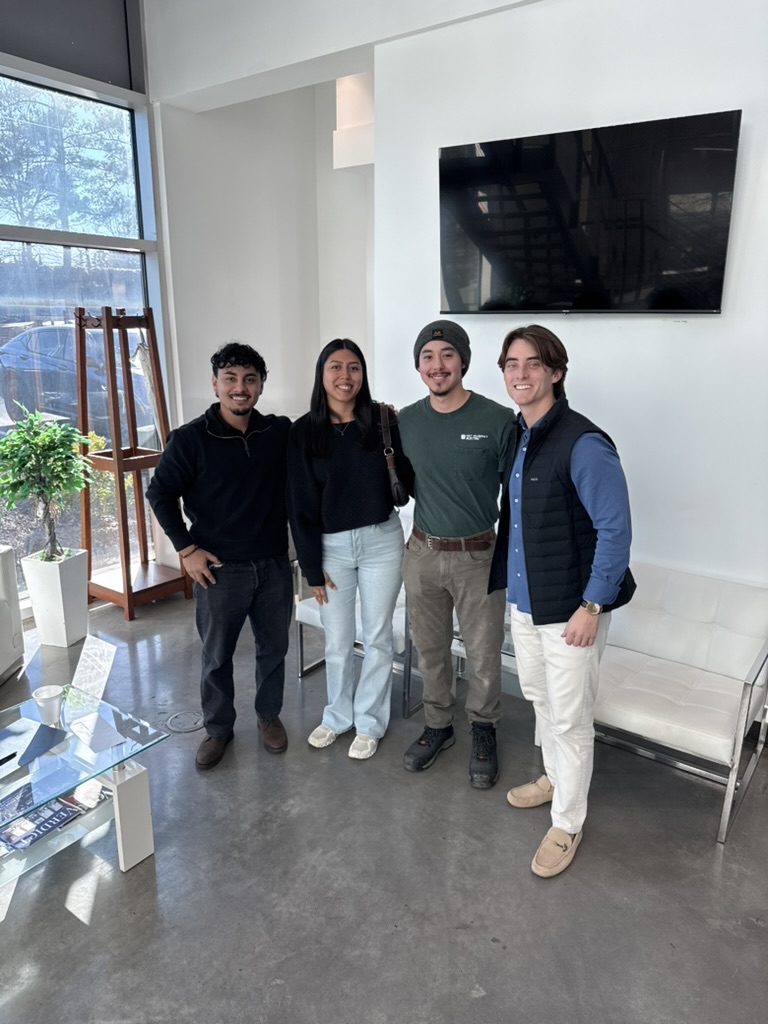 Justin Trevilla with clients after completing their home purchase