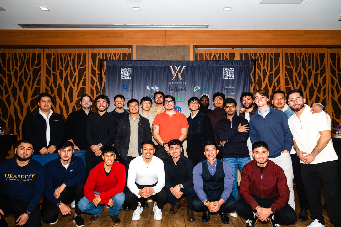 WealthX ATL community members gathered for a group photo